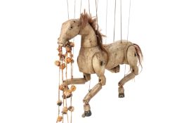 A LARGE CARVED WOOD HORSE PUPPET