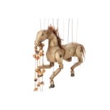 A LARGE CARVED WOOD HORSE PUPPET