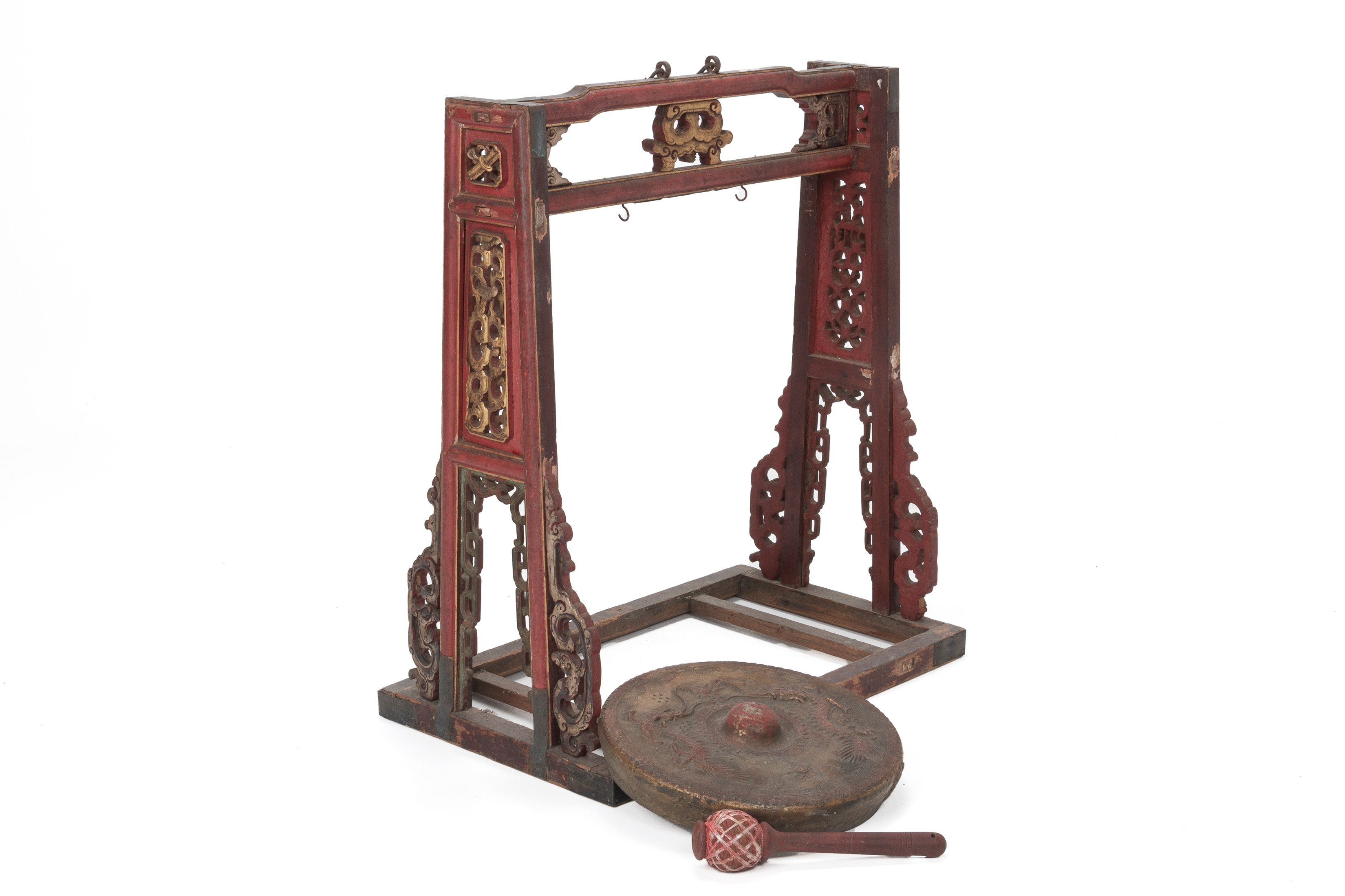 A CARVED AND RED LACQUER GONG ON STAND WITH BEATER