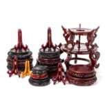 A LARGE ASSORTMENT OF ORIENTAL WOOD STANDS