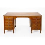 A VINTAGE TEAK TWIN PEDESTAL DESK