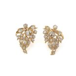 A PAIR OF DIAMOND EARRINGS