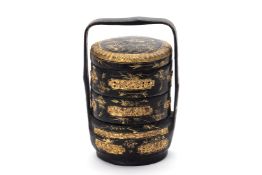 A SMALL BLACK AND GILT LACQUER THREE TIER WEDDING BASKET