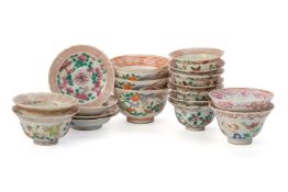 A GROUP OF EIGHTEEN VARIOUS TEA CUPS AND DISHES
