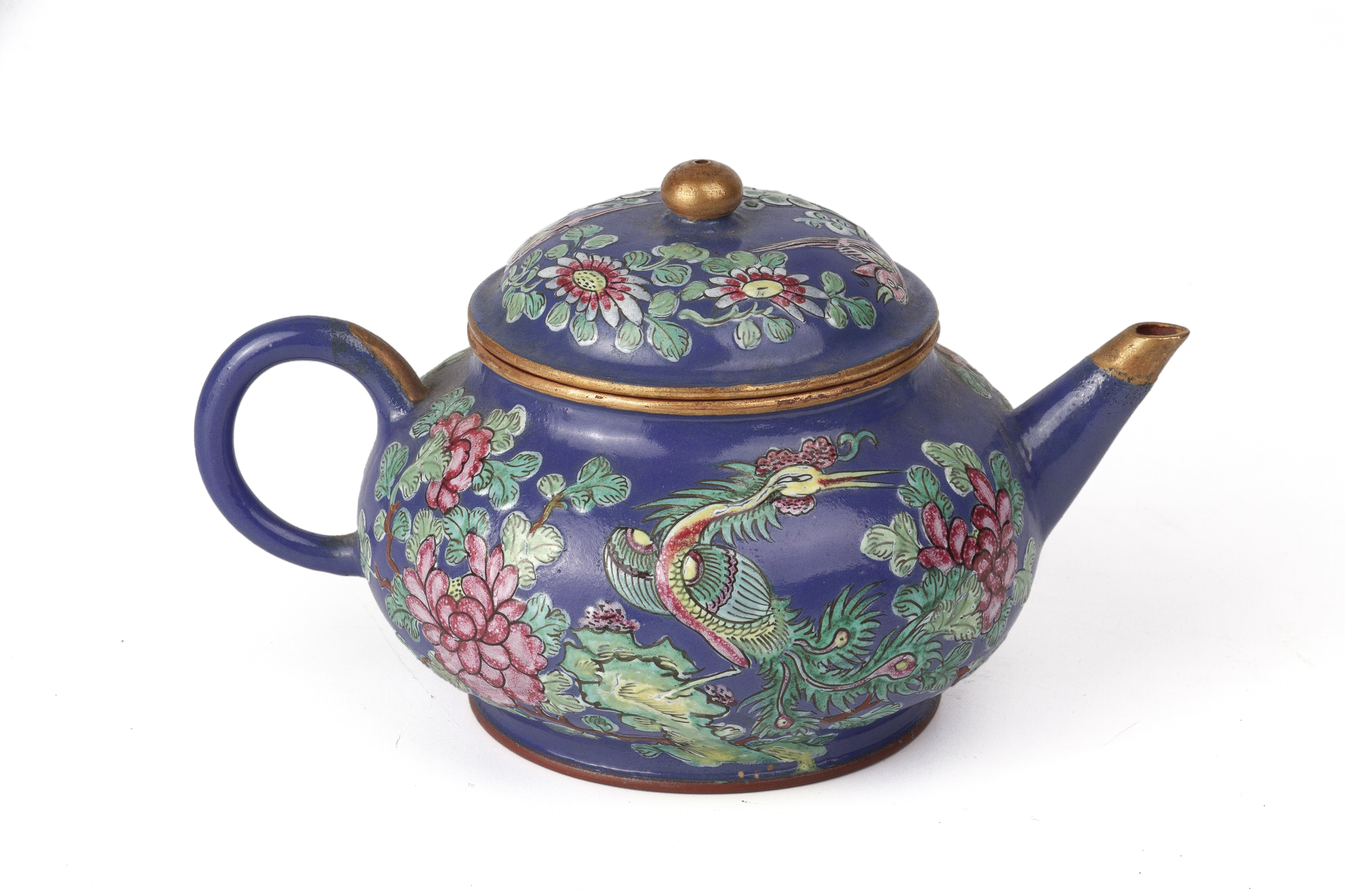 AN ENAMELLED YIXING POTTERY TEAPOT