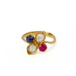 A DIAMOND, SYNTHETIC RUBY AND SYNTHETIC SAPPHIRE RING