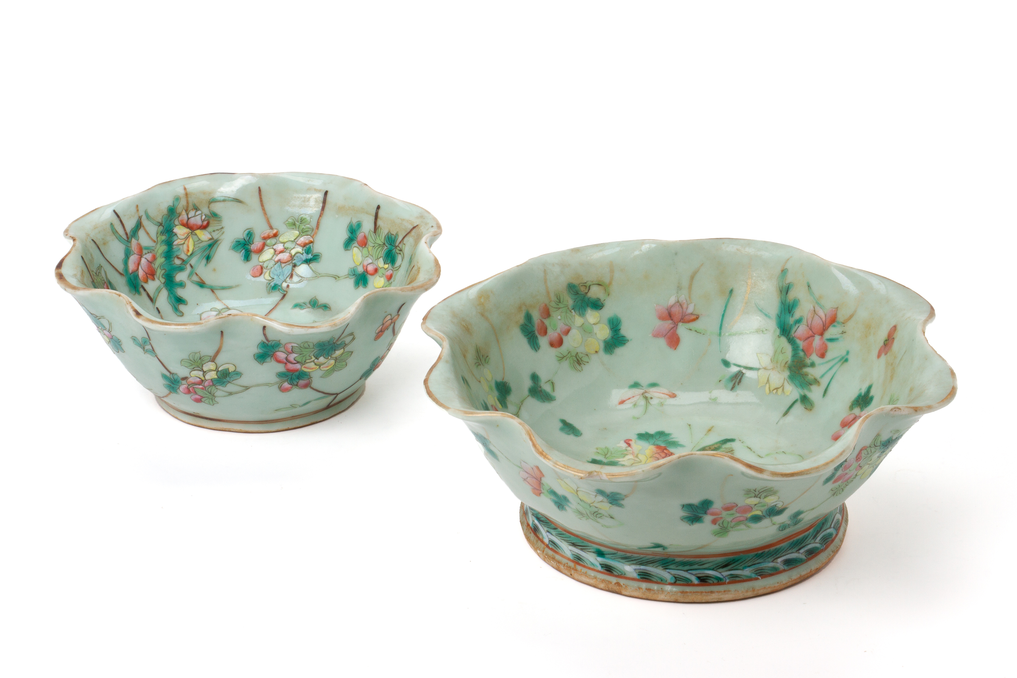 TWO CELADON GROUND FAMILLE ROSE OFFERING BOWLS