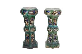 A PAIR OF GREEN GLAZED JARDINIERE STANDS