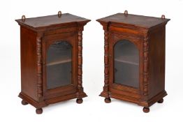 A PAIR OF SMALL GLAZED TEAK DISPLAY CABINETS