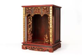 A CARVED RED LACQUER AND GILT ALTAR SHRINE