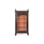 A CARVED AND GLAZED DISPLAY CABINET