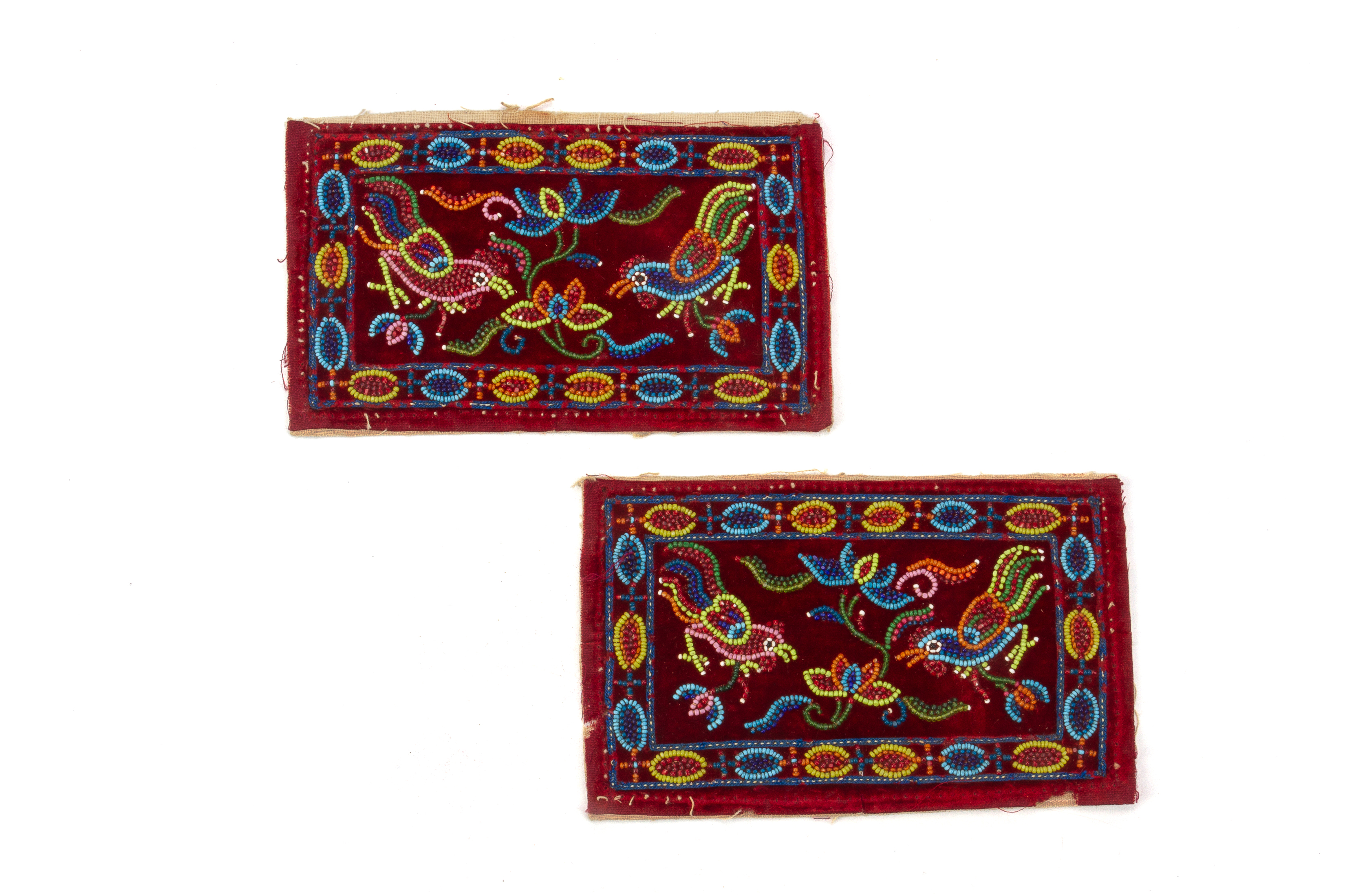 A PAIR OF BEADED VELVET PILLOW ENDS