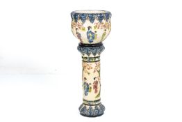 A JAPANESE POTTERY JARDINIERE ON STAND