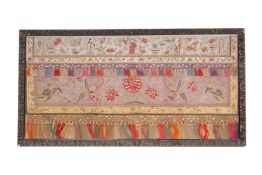 AN EMBROIDERED AND TASSELED SILK PANEL