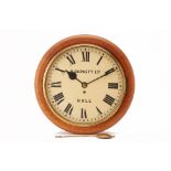 A VICTORIAN CIRCULAR OAK WALL CLOCK