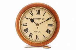 A VICTORIAN CIRCULAR OAK WALL CLOCK