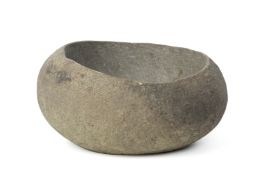 AN ANTIQUE STONE MORTAR BOWL