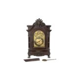 A LATE VICTORIAN TRIPLE FUSEE CHIMING TABLE CLOCK