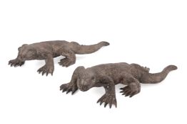A PAIR OF CAST METAL MODELS OF MONITOR LIZARDS