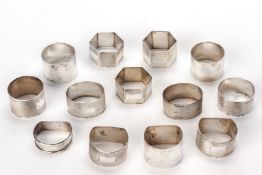 A GROUP OF 13 ENGLISH SILVER NAPKIN RINGS