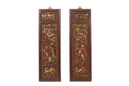 A PAIR OF CARVED, GILT AND RED LACQUER PANELS