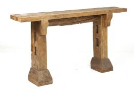 A RECLAIMED WOOD CONSOLE TABLE