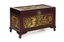 A CARVED GILT AND RED LACQUER CAMPHOR LINED CHEST