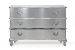 AN ITALIAN SILVERED SERPENTINE CHEST OF DRAWERS BY SELVA