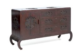 A CARVED WOOD SIDEBOARD