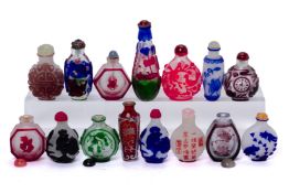 A GROUP OF FIFTEEN OVERLAID GLASS SNUFF BOTTLES