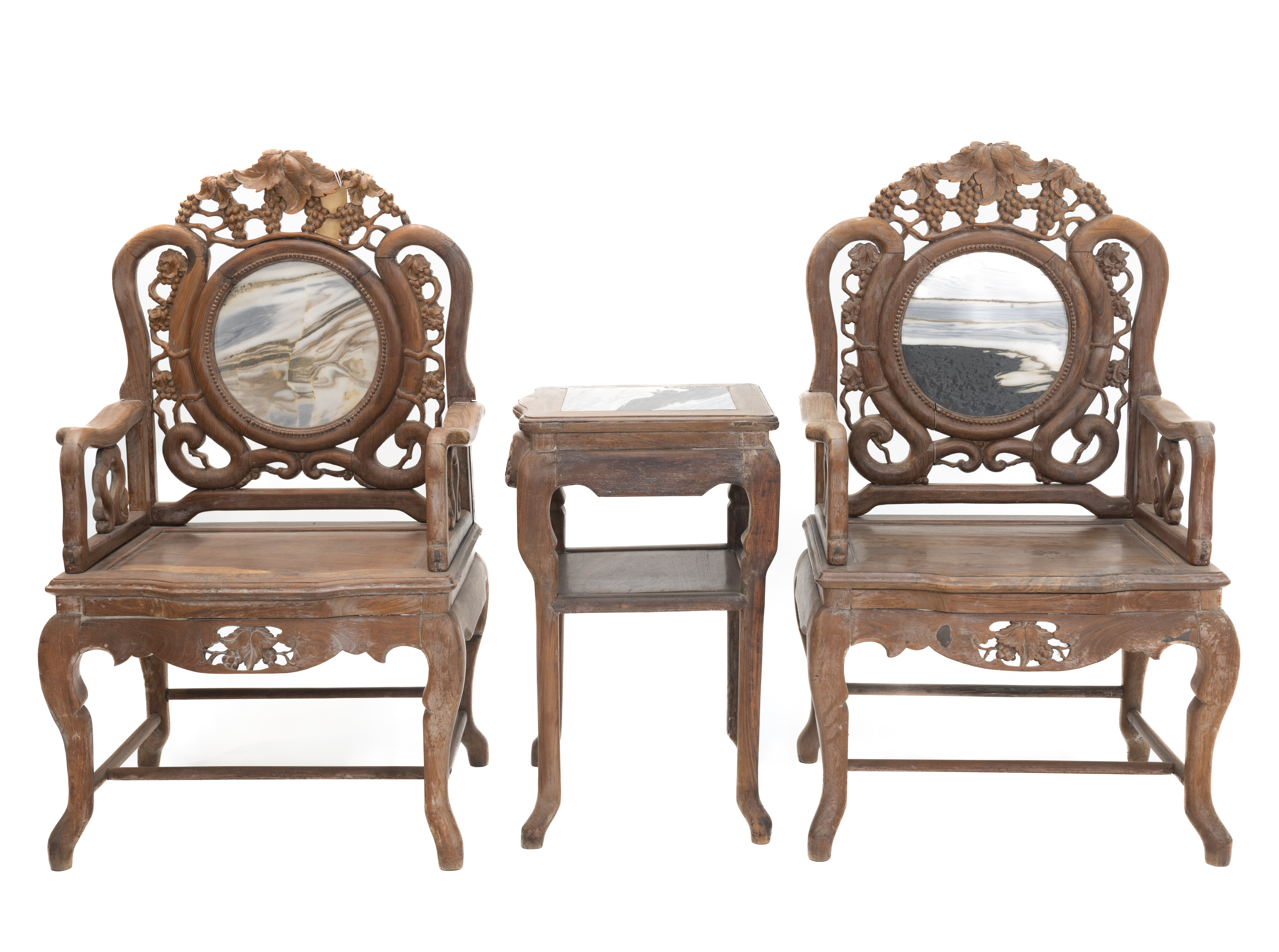 *A PAIR OF MARBLE INSET CARVED HARDWOOD ARMCHAIRS AND TABLE