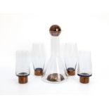 A TOM DIXON GLASS DECANTER AND GLASSES