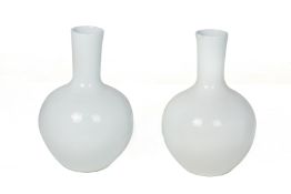 A PAIR OF WHITE PORCELAIN VASES