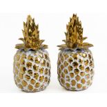 A PAIR OF METALLIC GLAZED CERAMIC PINEAPPLE ORNAMENTS