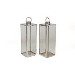 A PAIR OF LARGE CHROME FINISHED METAL AND GLASS LANTERNS
