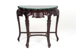 A CARVED WOOD AND BURL WOOD INSET DEMI LUNE SIDE TABLE