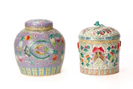 TWO FAMILLE ROSE BUTTERFLY JARS AND COVERS