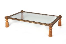 AN INDIAN METAL MOUNTED AND GLASS TOPEED COFFEE TABLE