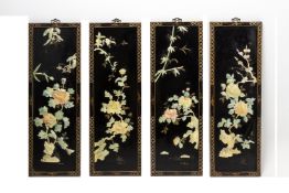 A SET OF FOUR LACQUER WALL PANELS