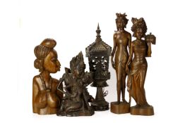 A GROUP OF BALINESE CARVED WOOD FIGURES AND A LANTERN