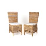 A PAIR OF WOVEN WICKER SIDE CHAIRS