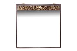 A SQUARE WALL MIRROR WITH CARVED GILTWOOD PANEL