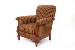 A SMALL UPHOLSTERED ARMCHAIR