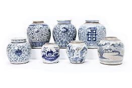 A GROUP OF SEVEN BLUE AND WHITE PORCELAIN GINGER JARS