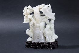 A JADE CARVING OF AN IMMORTAL