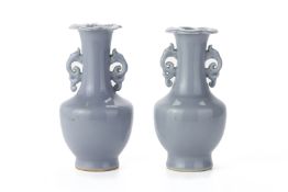 TWO SIMILAR CLAIR DE LUNE TWIN HANDLED VASES