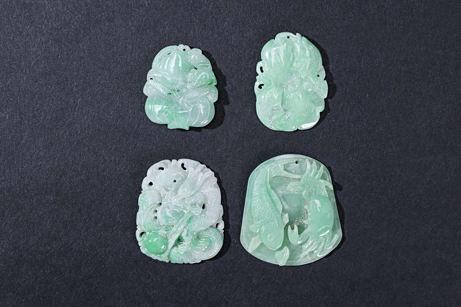 A GROUP OF EIGHT CARVED JADE PENDANTS - Image 3 of 3