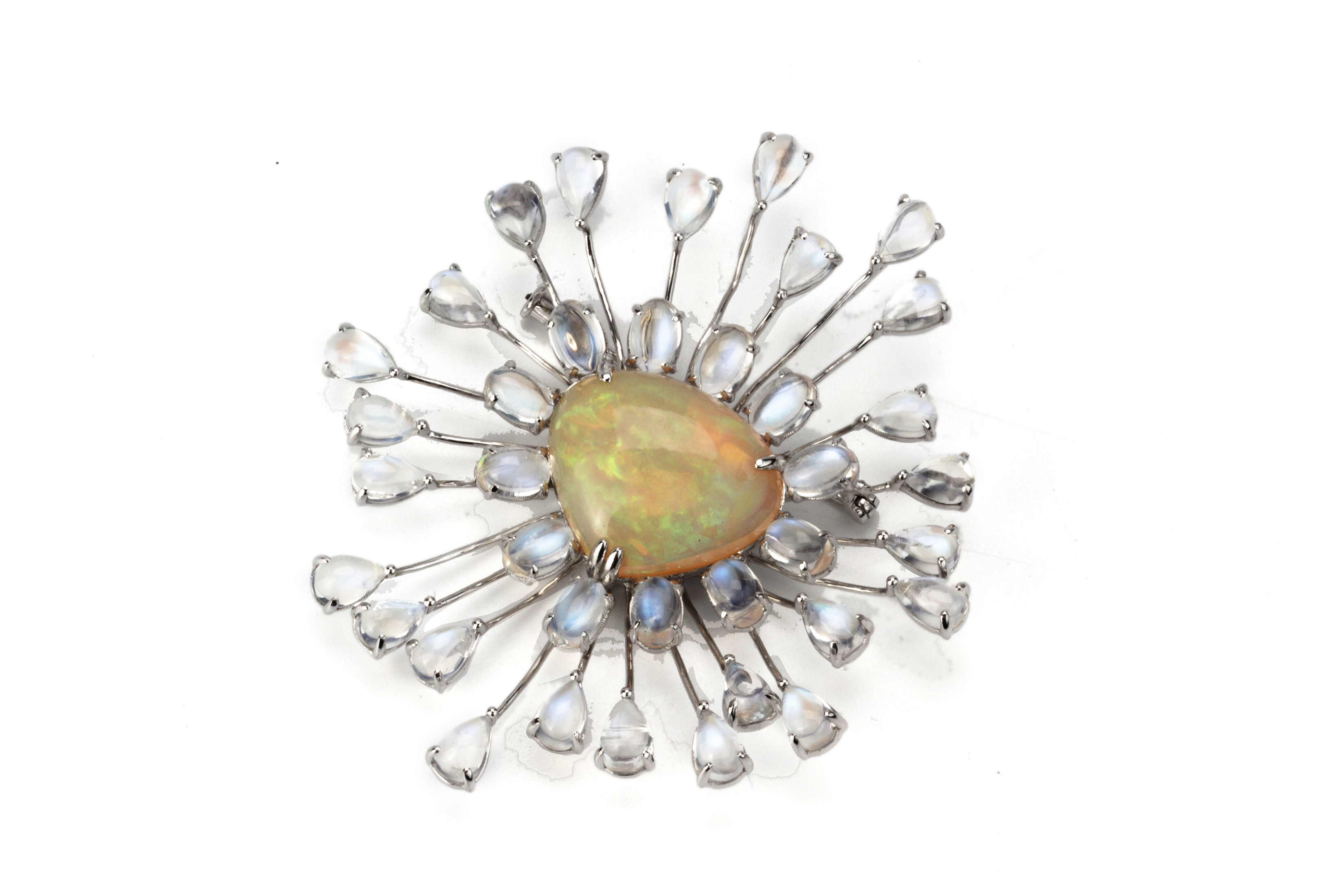 AN OPAL AND MOONSTONE BROOCH