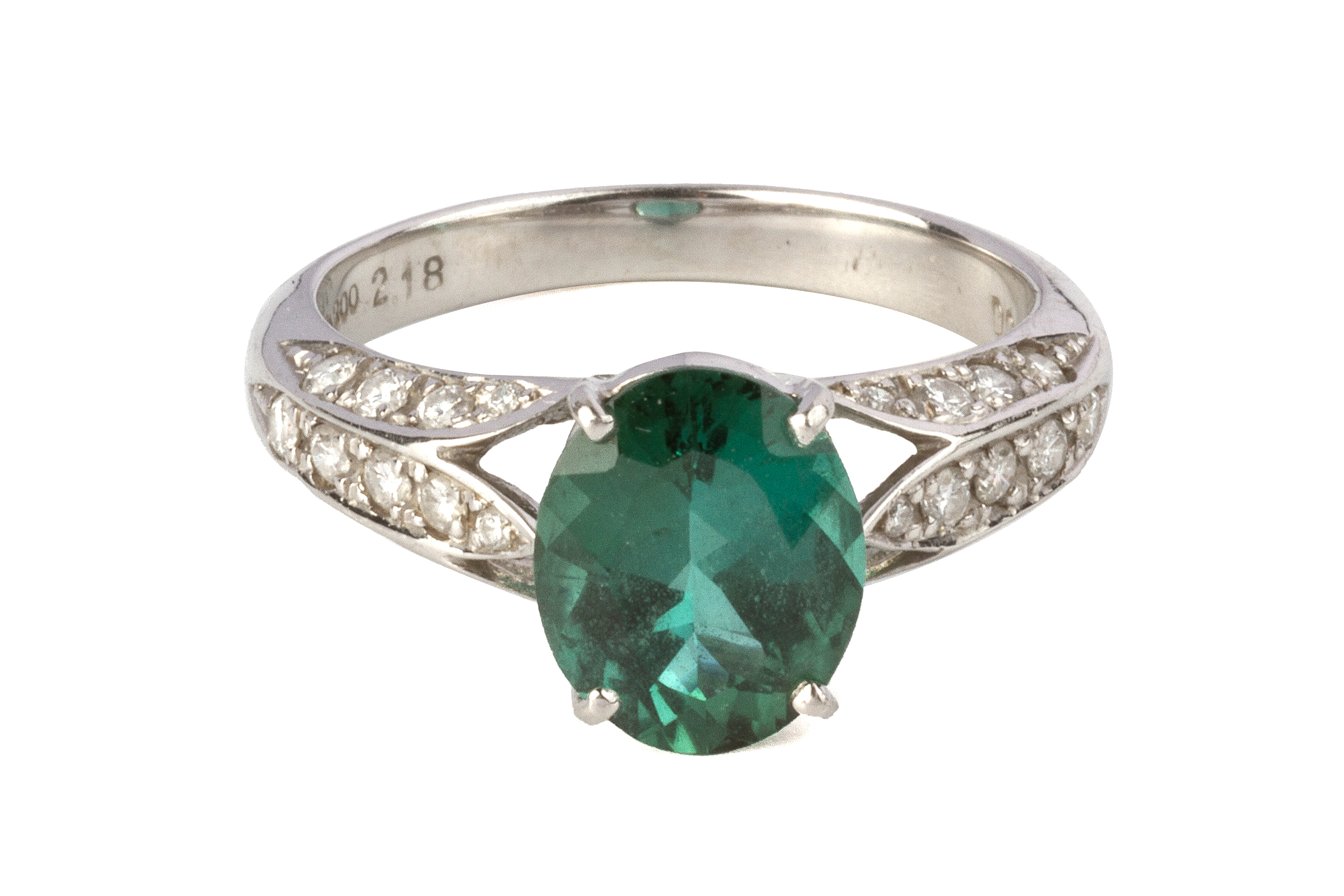 A TOURMALINE AND DIAMOND PLATINUM RING