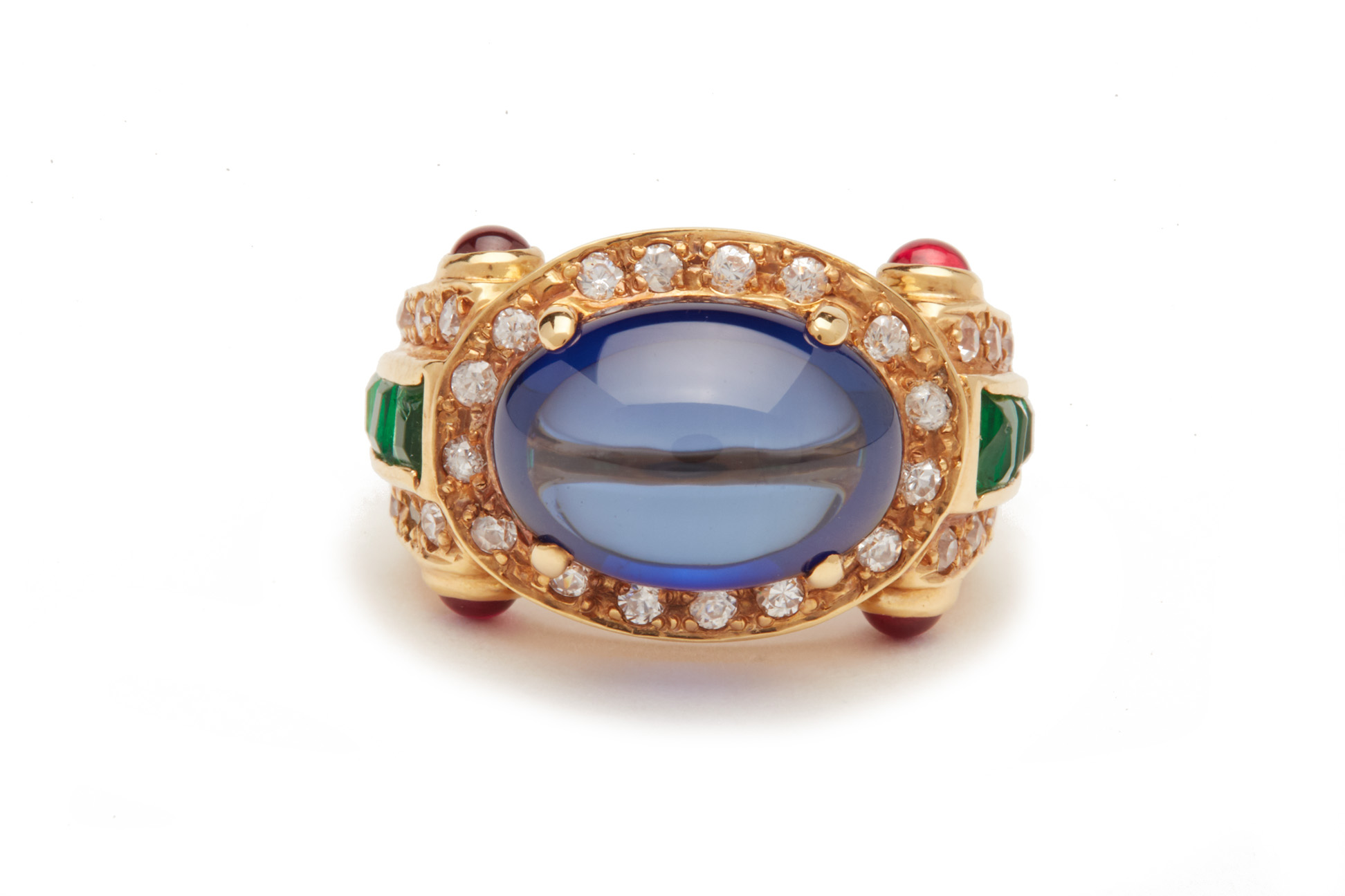 A SYNTHETIC STAR SAPPHIRE, DIAMOND AND EMERALD RING